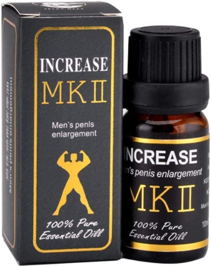 Mk2 Extra Strength Men’s penis enlargement Supplement bottle with natural essential oils like jasmine, sandalwood, camellia seed oil, and jojoba oil displayed around it.